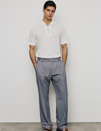 Παντελόνι με loose γραμμή, πιέτες και κούμπωμα στο πλάι