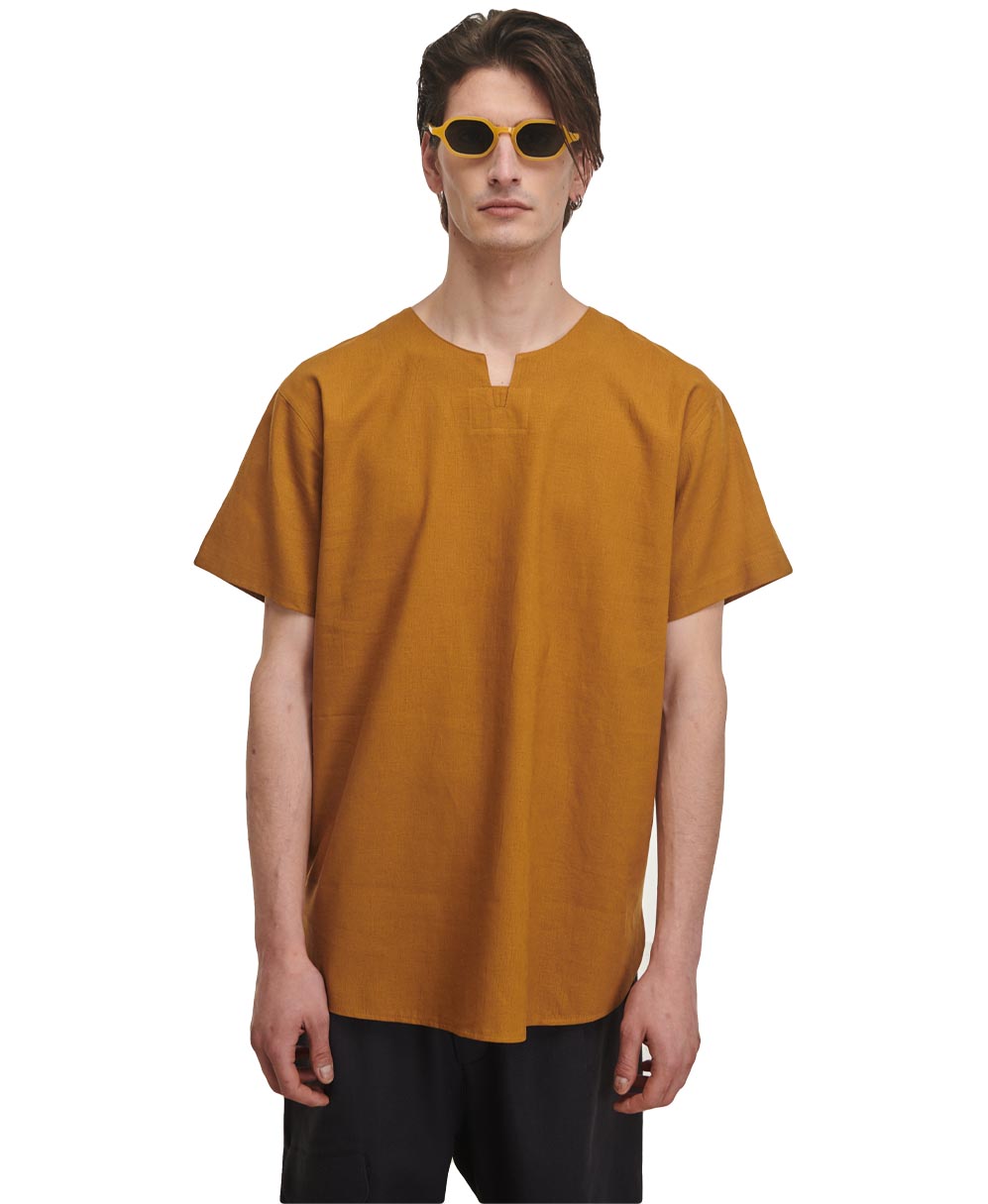 bronze tshirt pcoc 2022 me asummetria longline oversized me anoigma sto laimo